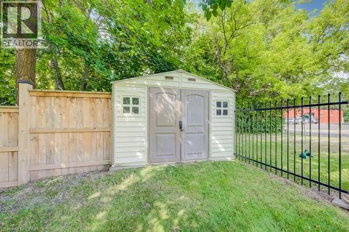 Storage shed with dual entry doors and grid windows - 185 Strange Street, Kitchener, ON - Outdoor