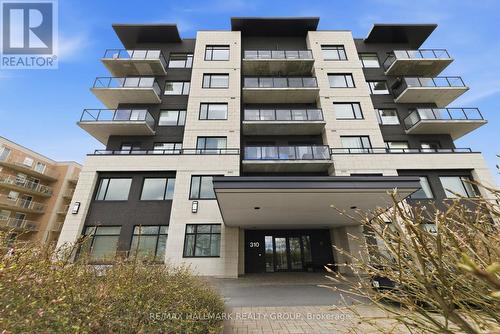 206 - 310 Centrum Boulevard, Ottawa, ON - Outdoor With Balcony With Facade