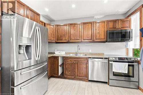 570 Cannon Street E, Hamilton, ON - Indoor Photo Showing Kitchen With Double Sink