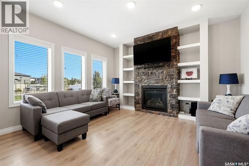 5148 Green Crescent, Regina, SK - Indoor Photo Showing Living Room With Fireplace