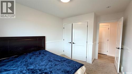 23 Chow Crescent, Outlook, SK - Indoor Photo Showing Bedroom