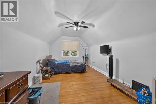 Hardwood flooring, sloped ceilings, ceiling fan, window with blinds - 75 Barons Avenue S, Hamilton, ON 