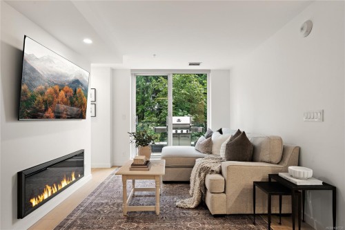 #222-2000 Hannington Rd, Langford, BC - Indoor Photo Showing Living Room With Fireplace