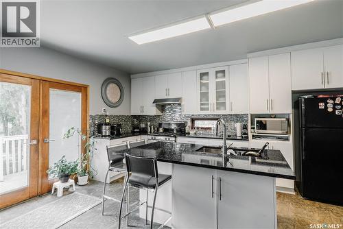 101 106Th Street W, Saskatoon, SK - Indoor Photo Showing Kitchen With Double Sink