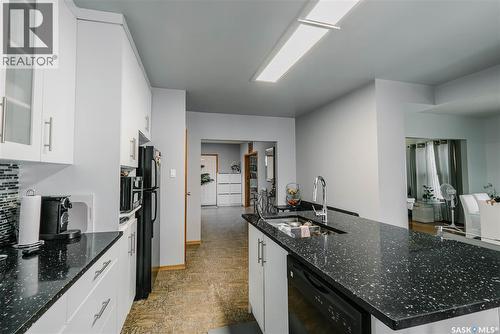 101 106Th Street W, Saskatoon, SK - Indoor Photo Showing Kitchen With Double Sink