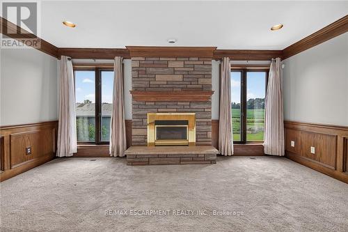 7011 Dickenson Road E, Hamilton, ON - Indoor Photo Showing Living Room With Fireplace