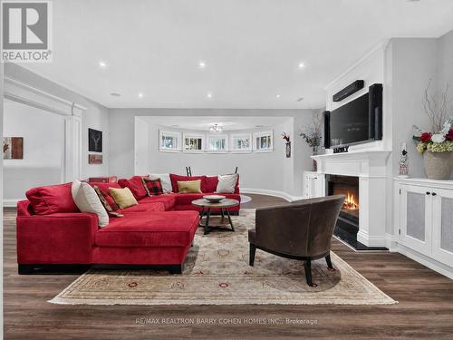 21 Don Ridge Drive, Toronto, ON - Indoor Photo Showing Living Room With Fireplace