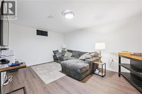 Recessed ceiling lighting, wood-finish flooring, and white painted walls - 765 Angler Way, Waterloo, ON - Indoor
