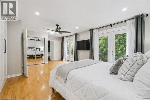 Hardwood-style flooring with recessed lighting and a ceiling fan - 267 Abraham Street, Cambridge, ON - Indoor Photo Showing Bedroom