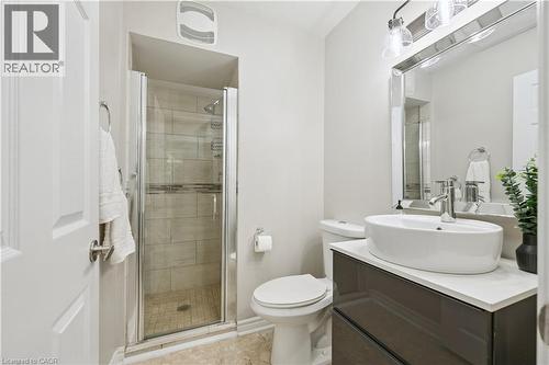 Glass-enclosed shower with tiled walls and a built-in shelf - 267 Abraham Street, Cambridge, ON - Indoor Photo Showing Bathroom