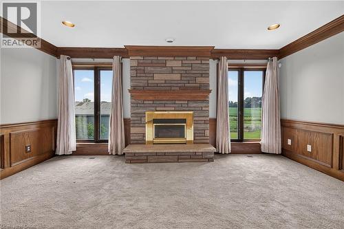 7011 Dickenson Road E, Mount Hope, ON - Indoor Photo Showing Living Room With Fireplace