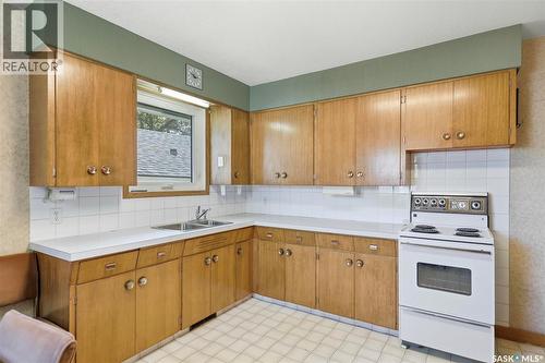 309 St John Street, Regina, SK - Indoor Photo Showing Kitchen With Double Sink
