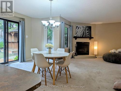 3279 Charlebrook Court, Mississauga, ON - Indoor Photo Showing Dining Room With Fireplace