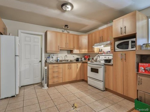 Logement - 87  - 89 Place Du Refuge, Sainte-Adèle, QC - Indoor Photo Showing Kitchen
