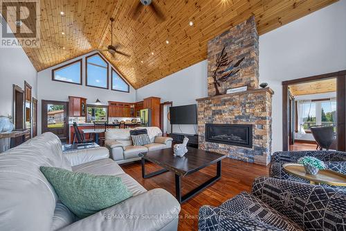 64 Mccords Road, Mckellar, ON - Indoor Photo Showing Living Room With Fireplace