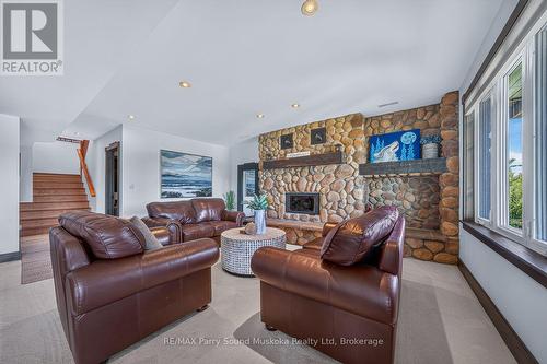 64 Mccords Road, Mckellar, ON - Indoor Photo Showing Living Room With Fireplace