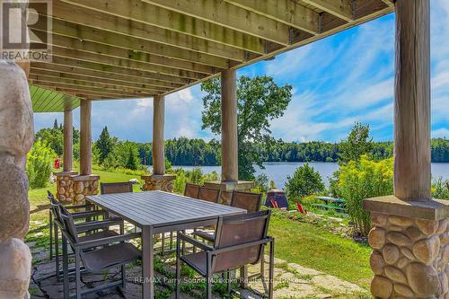 64 Mccords Road, Mckellar, ON - Outdoor With Body Of Water With Deck Patio Veranda With Exterior