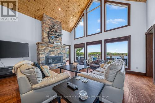 64 Mccords Road, Mckellar, ON - Indoor Photo Showing Living Room With Fireplace