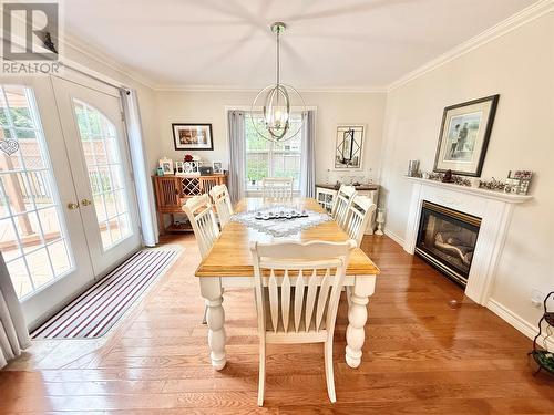 304 Grenfell Heights, Grand Falls-Windsor, NL - Indoor Photo Showing Dining Room With Fireplace