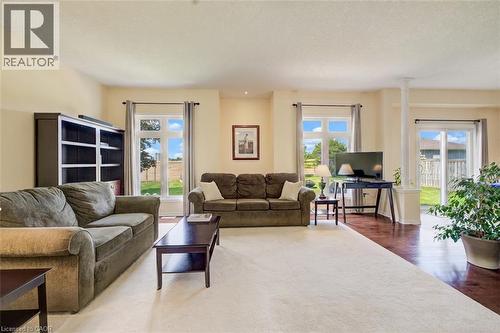Recessed lighting, light-toned walls, and hardwood flooring - 64 Kropf Drive, Baden, ON - Indoor Photo Showing Living Room