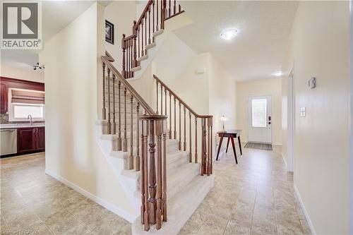 Linoleum flooring extending throughout the entryway and kitchen - 64 Kropf Drive, Baden, ON - Indoor Photo Showing Other Room