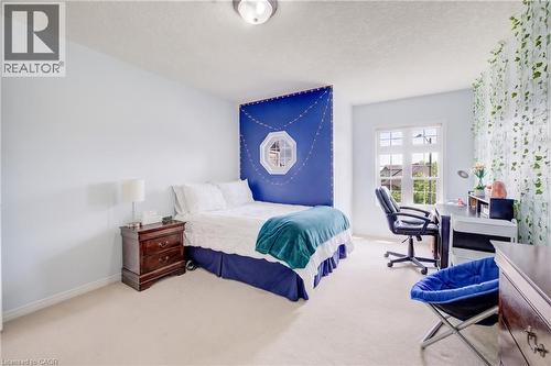 Carpeted room featuring a double window,, and a ceiling light - 64 Kropf Drive, Baden, ON - Indoor Photo Showing Bedroom
