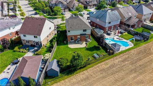 Expansive backyard featuring a surrounding patio, and a detached shed - 64 Kropf Drive, Baden, ON - Outdoor