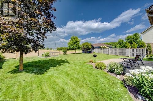 Expansive lawn with a paver patio and mature landscaping - 64 Kropf Drive, Baden, ON - Outdoor