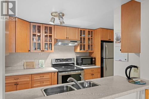 207 - 23 Rogers Road, Perth, ON - Indoor Photo Showing Kitchen With Double Sink