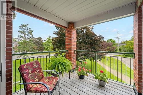 Balcony at the front of the building - 207 - 23 Rogers Road, Perth, ON - Outdoor With Deck Patio Veranda With Exterior