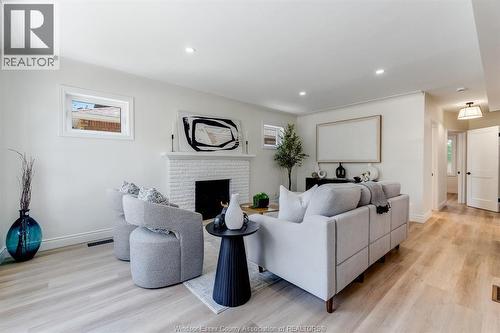 2309 Hall, Windsor, ON - Indoor Photo Showing Living Room With Fireplace