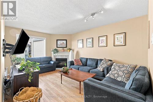 22 Manhattan Crescent, Ottawa, ON - Indoor Photo Showing Living Room With Fireplace