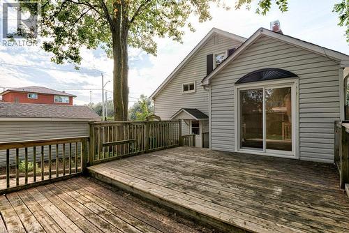 Expansive wood deck with railing and direct access to the home via sliding glass doors - 99 Shantz Lane, Kitchener, ON - Outdoor With Deck Patio Veranda With Exterior