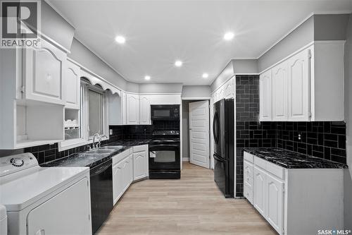 2225 Bedford Avenue E, Regina, SK - Indoor Photo Showing Kitchen With Double Sink