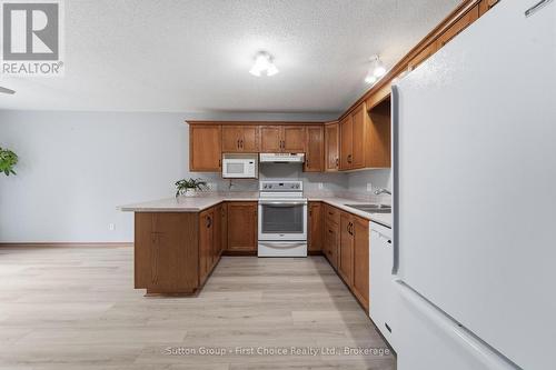 56 Huron Road, West Perth (Mitchell), ON - Indoor Photo Showing Kitchen With Double Sink