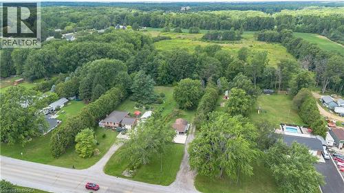 Expansive property featuring mature trees and a manicured lawn - 995 Mcdowell Road E, Simcoe, ON - Outdoor With View