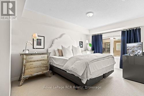 Staged Photo - Bedroom - #308 - 7 Anchorage Crescent, Collingwood, ON - Indoor Photo Showing Bedroom