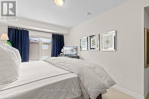 Staged Photo - Bedroom #2 - #308 - 7 Anchorage Crescent, Collingwood, ON - Indoor Photo Showing Bedroom