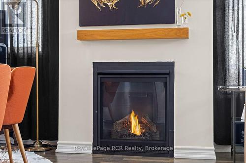Nat Gas Fireplace - #308 - 7 Anchorage Crescent, Collingwood, ON - Indoor Photo Showing Living Room With Fireplace