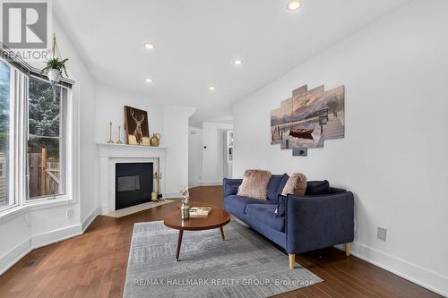 23 Whitegate Crescent, Ottawa, ON - Indoor Photo Showing Living Room With Fireplace