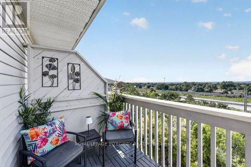 404 - 345 Centrum Boulevard, Ottawa, ON - Outdoor With Balcony With Exterior