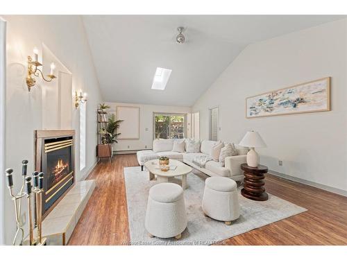 3740 Ouellette, Windsor, ON - Indoor Photo Showing Living Room With Fireplace
