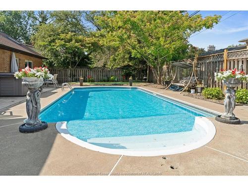 3740 Ouellette, Windsor, ON - Outdoor With In Ground Pool With Backyard