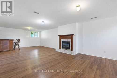 Cozy Fireplace for Cool Nights! - 53 Yoho Drive, Ottawa, ON - Indoor Photo Showing Living Room With Fireplace