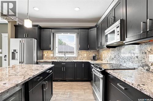 321 110Th Street W, Saskatoon, SK - Indoor Photo Showing Kitchen With Upgraded Kitchen