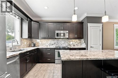 321 110Th Street W, Saskatoon, SK - Indoor Photo Showing Kitchen With Double Sink With Upgraded Kitchen