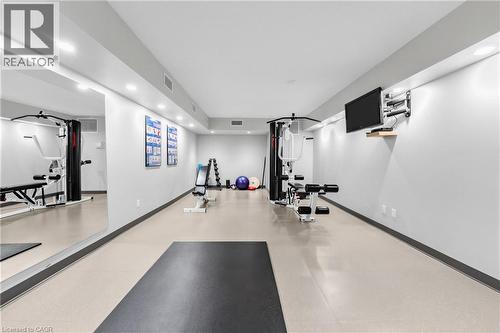 Dedicated fitness space featuring light-colored flooring and recessed lighting - 1477 Lakeshore Road Unit# Ph 1, Burlington, ON 