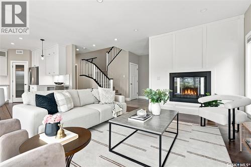 232 Secord Way, Saskatoon, SK - Indoor Photo Showing Living Room With Fireplace