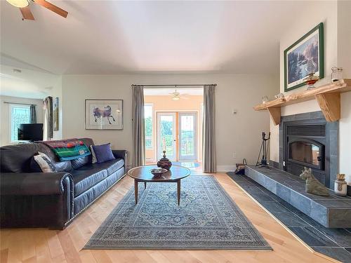 95033 131W Road, Strathclair, MB - Indoor Photo Showing Living Room With Fireplace