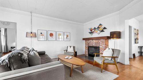 701 Broadway Street, Nakusp, BC - Indoor Photo Showing Living Room With Fireplace